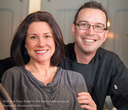 Nick and Tracy Rabar in the front of the house at Avenue N American Kitchen.