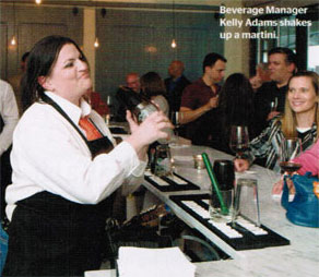Beverage Manager Kelly Adams shakes up a martini.